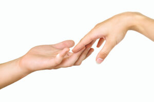 male and female hands touching