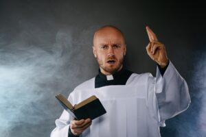 priest giving sermon