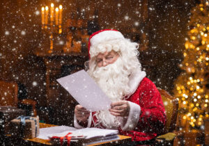 Santa Claus reading letters from children
