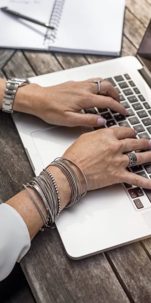 writer hands on keyboard